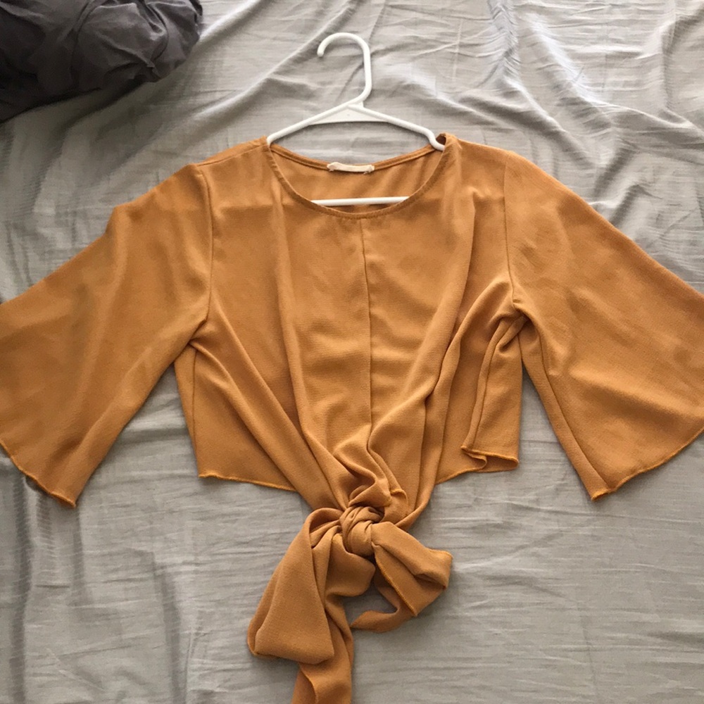 Yellow cropped blouse